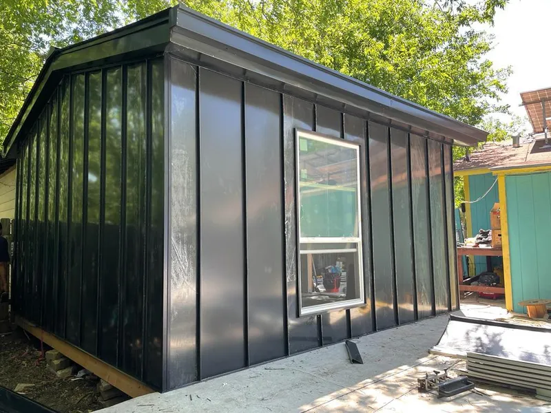 Black standing seam metal wall panels for Roof Inspection in Mead