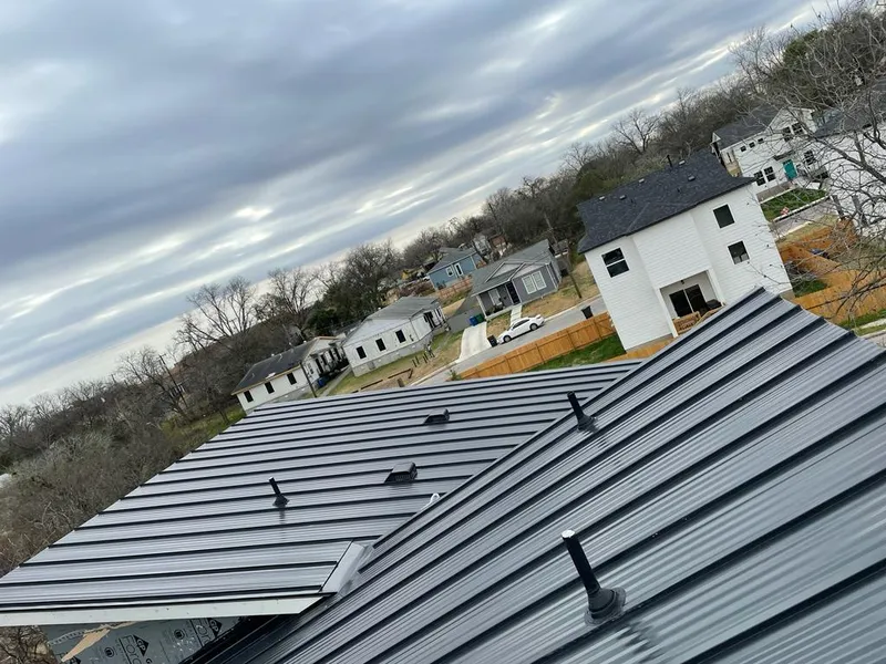 Standing seam metal roof panels with vents for Skylight Repair in Mead